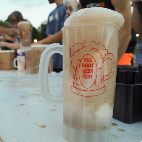 root beer float in a plastic mug