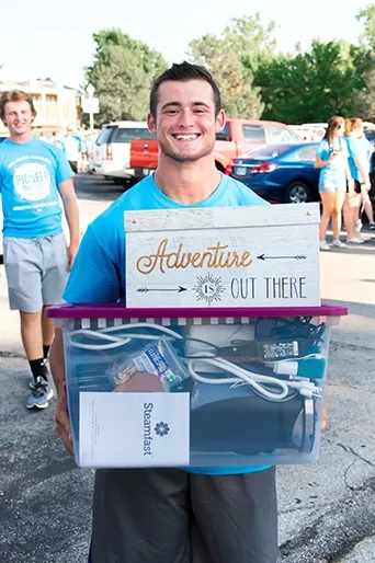 Student moving in to dorm