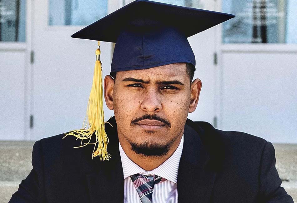 Denzel Mena at his 2021 graduation from MNU