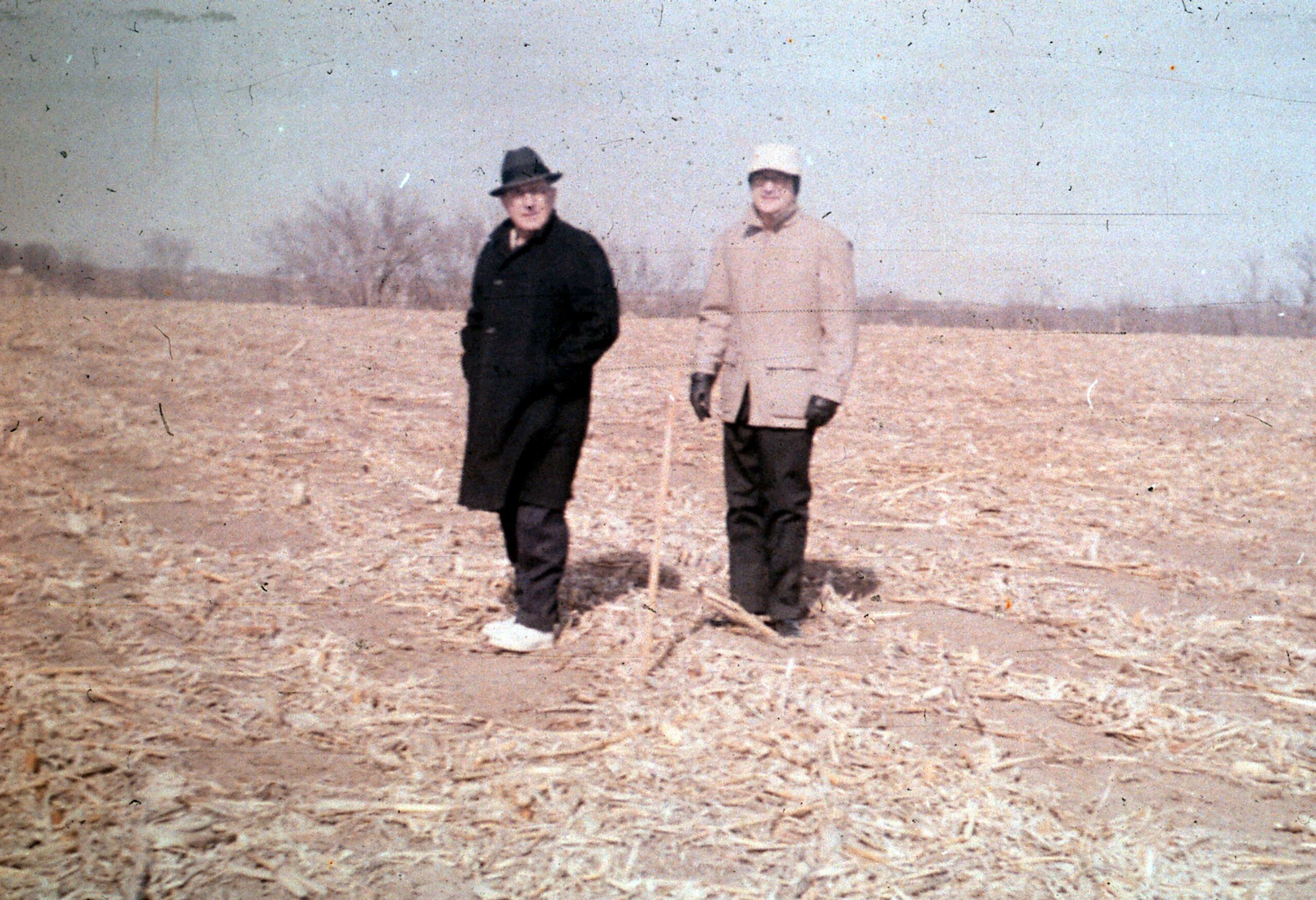 Donald Metz with R. Curtis Smith in cornfield that became MNU campus. Circa 1966.