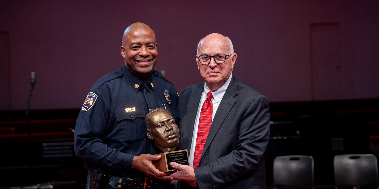 Olathe Police Major John Roland receives MLK Living Legacy Award from MNU President David Spittal
