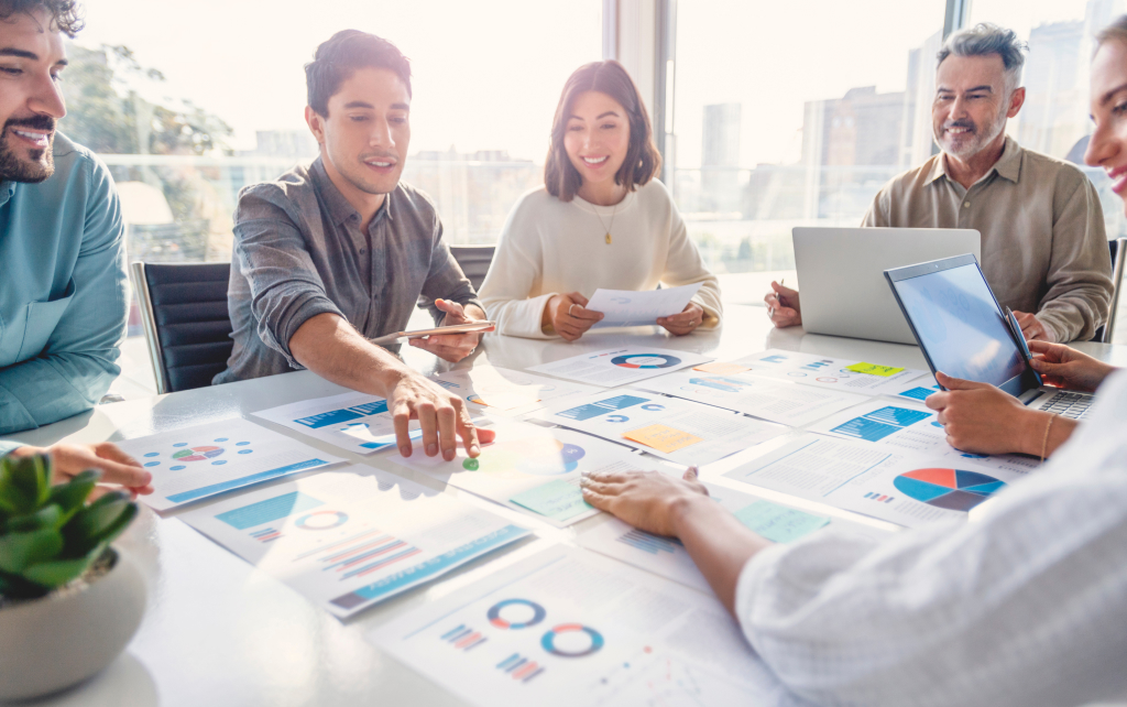 Students around a table in a planning session