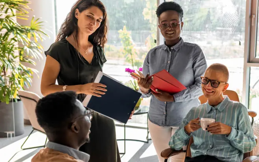 Teacher and students discussing a concept