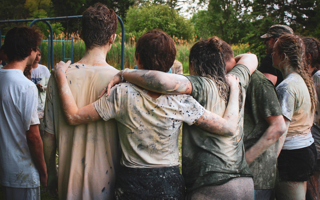 Students in a prayer circle after an event