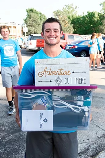 Student moving in to a dorm