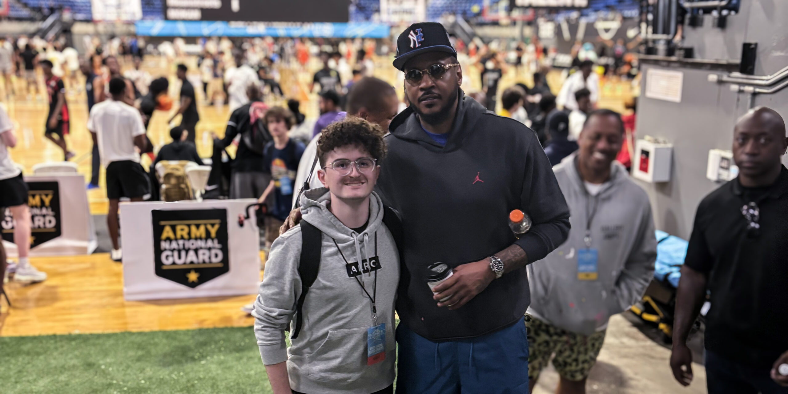 Zach Janner with Carmelo Anthony at elite basketball tournament