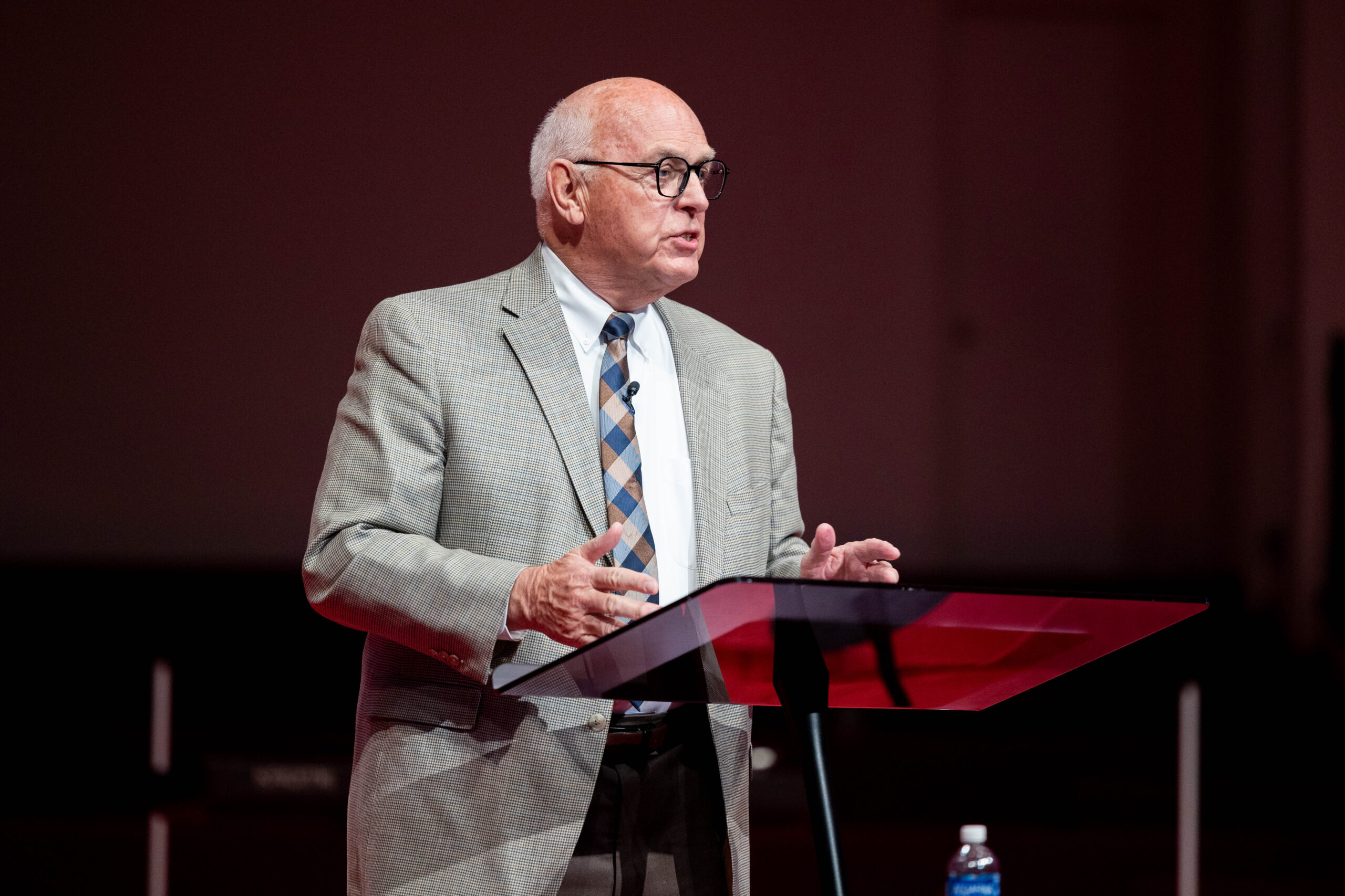 MNU president Dr. David J. Spittal speaking on stage at the 30 year recognition chapel in 2024