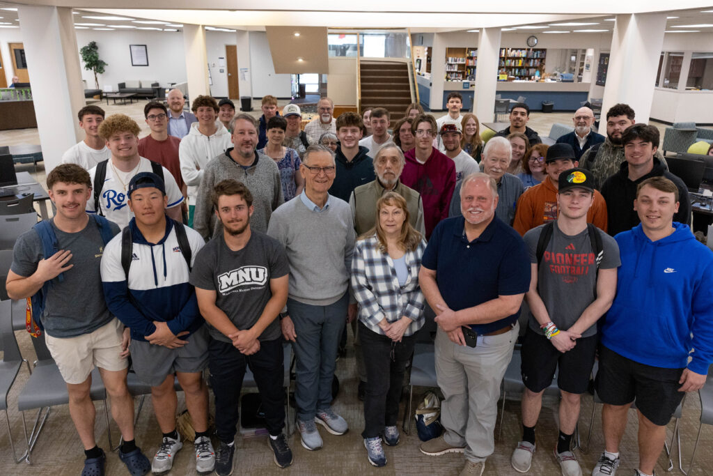 Large group photo of history students with members of Johnson County Kansas Heritage Foundation in Mabee Library