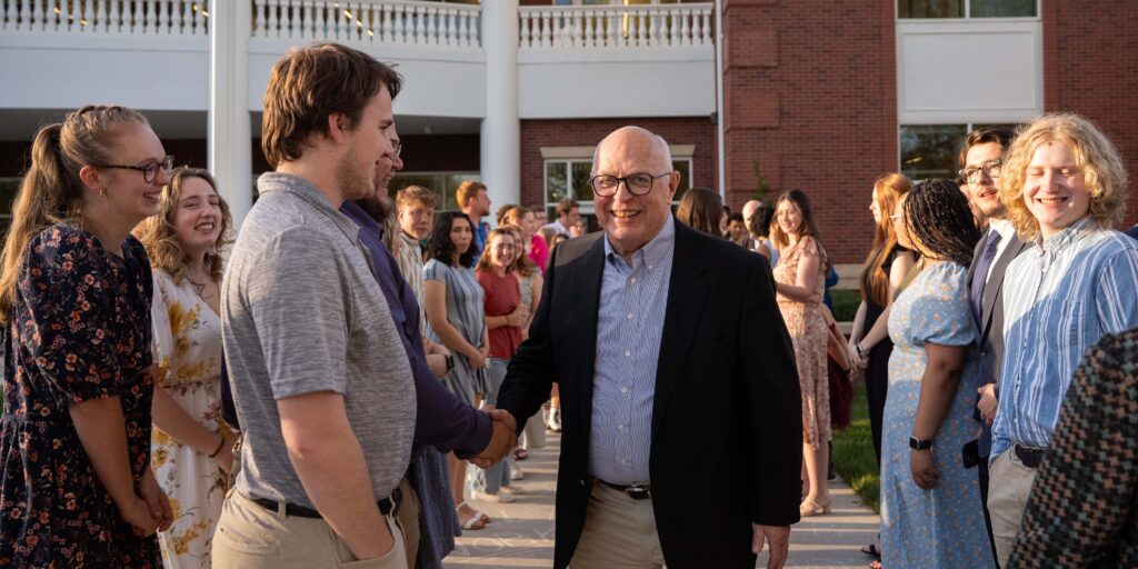 Dr. Spittal with student leaders on campus