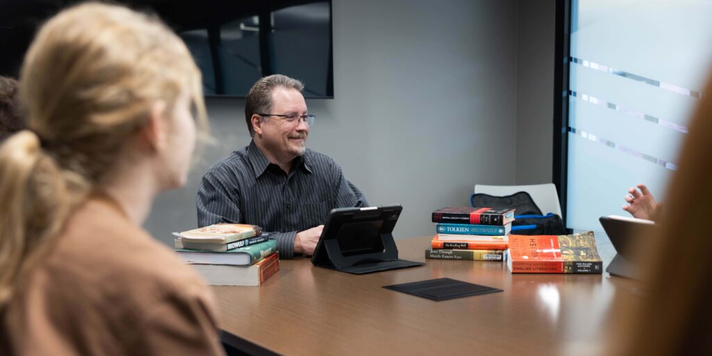 Daniel Schwabauer teaching in small group setting