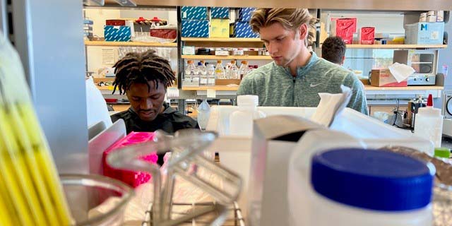 James-M-and-Aiden-in-lab-web-1.jpg