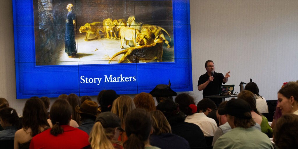 photo of daniel schwabauer teaching students at One Year Adventure Novel workshop