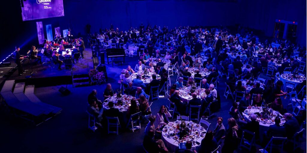 A sold out crowd enjoys dinner and music from the Chamber Orchestra at President's Honors