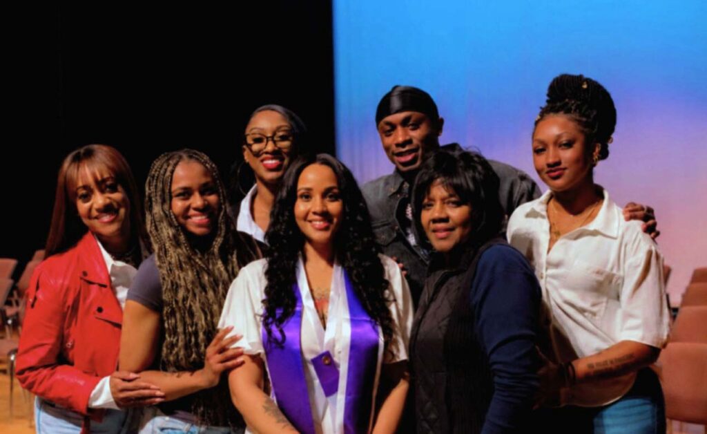 Brittney Thompson poses with family, friends and Worthy 1 supporters Xavier Worthy and his mother Nicky Jones.