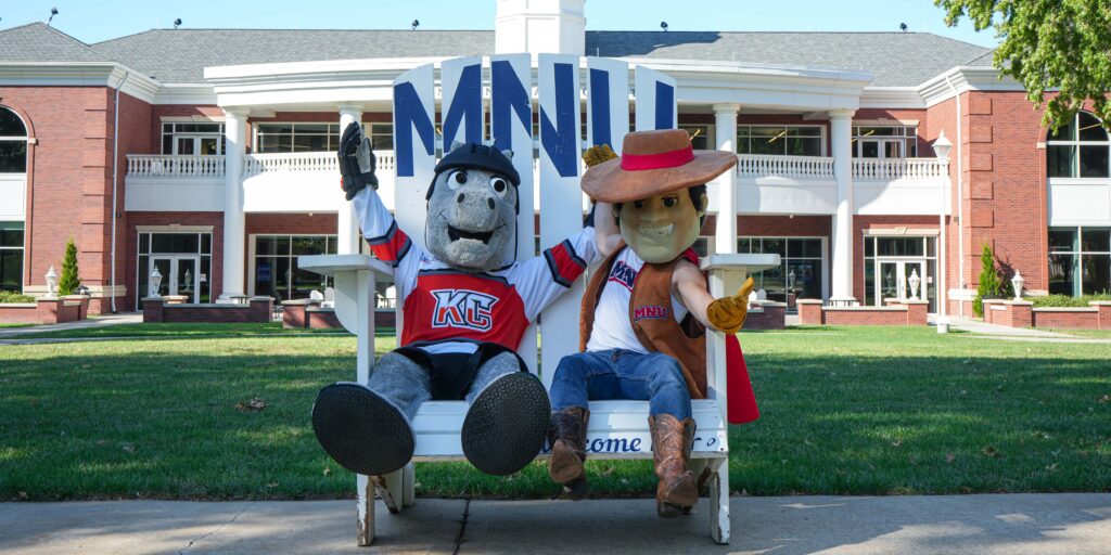 Kansas City Mavericks Mascot Mac with MNU Mascot Pioneer Pete on the campus of MNU