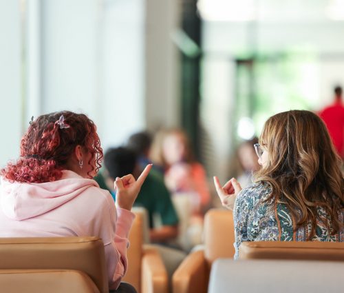 Image of students sitting in MNU's Cunningham Center.